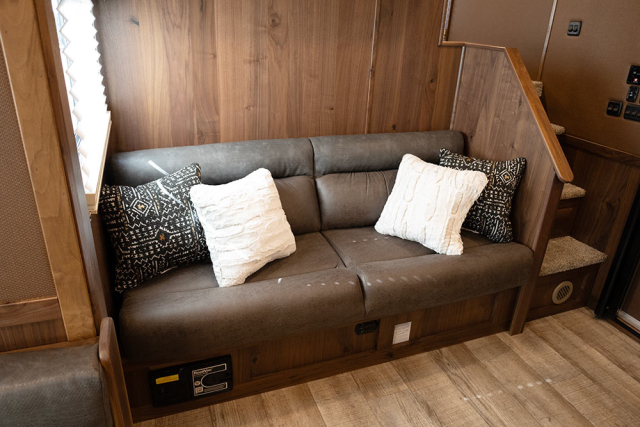 Sofa in LL8X18BBSRB Laramie Edition Livestock Trailer | Lakota Trailers