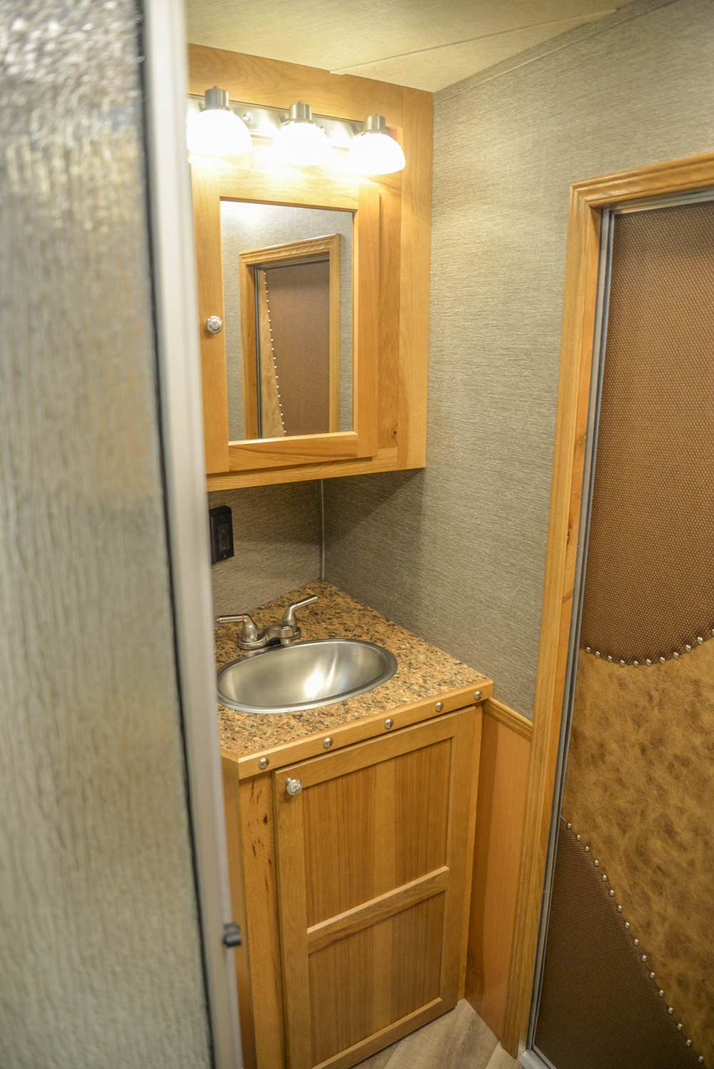 Sink in Bathroom Area in SL8X11SRK Laramie Edition Horse Trailer | SMC Trailers