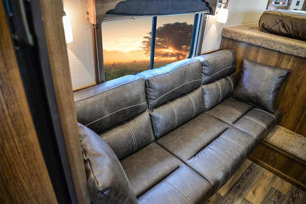 Sofa Bed in a SLX10RK Laramie Horse Trailers | SMC Trailers