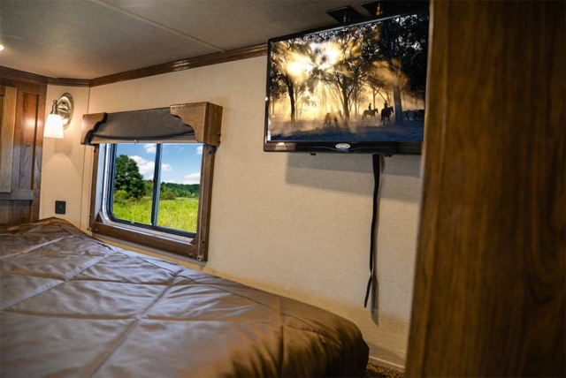 Bedding and Entertainment Area in a SLX10RK Laramie Horse Trailers | SMC Trailers