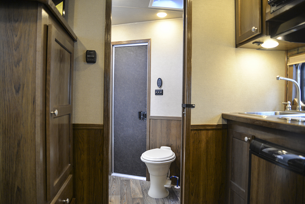 Bathroom Entrance in a SL8X9SR Laramie Horse Trailers | SMC Trailers