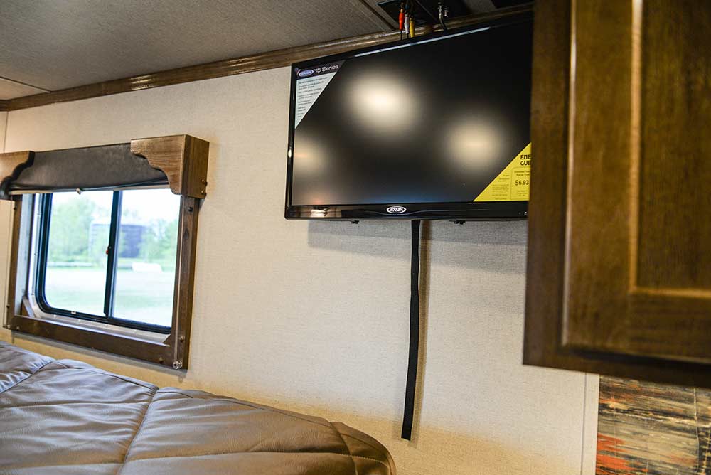 Bedroom TV in a Laramie SLX8FK Horse Trailer | SMC Trailers