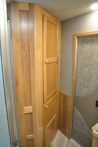 Cabinets in Bathroom Area in SL8X15SRKCE Laramie Edition Horse Trailer | SMC Trailers