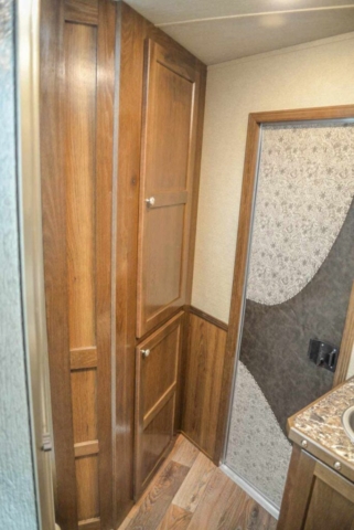 Cabinets in Bathroom in SL8X11DR Laramie Edition Horse Trailer | SMC Trailers